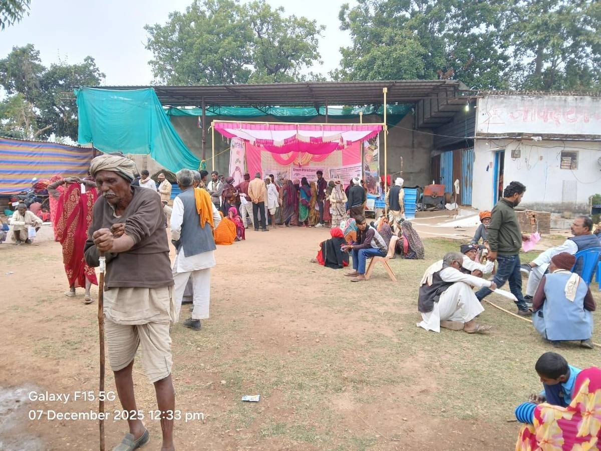 Large outdoor health camp with senior citizen villagers in Ghauara, December 2025