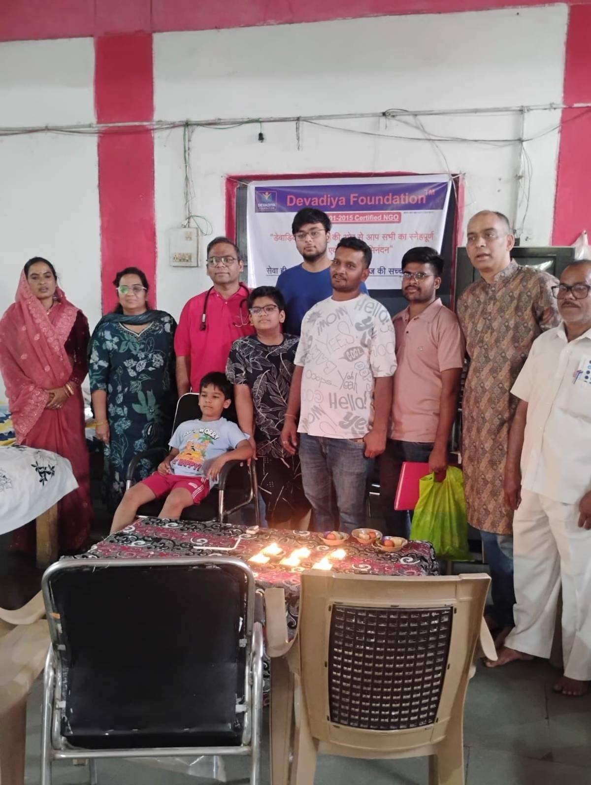 Senior citizens and Devadiya Foundation volunteers gathered at a community health and Seva Card event
