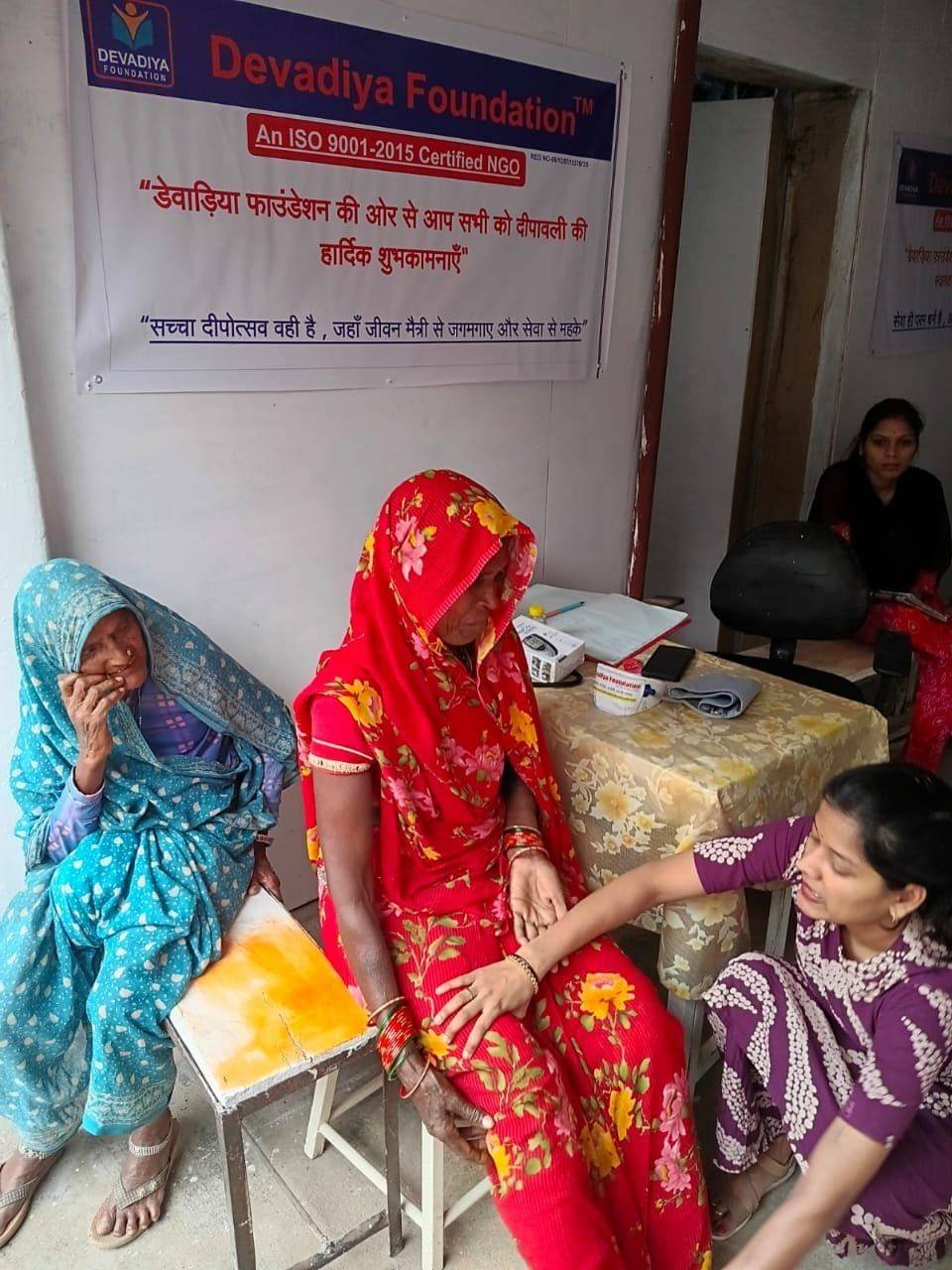 Senior citizens receiving health consultations